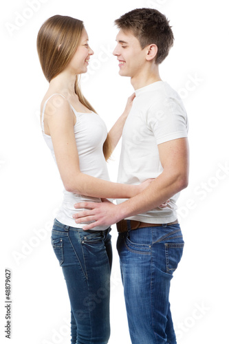 Photo: Young couple in white t-shirts Young couple in white t-shirts