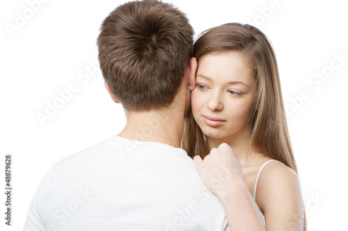 Photo: Young couple in white t-shirts Young couple in white t-shirts
