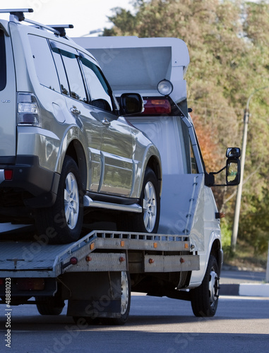 Photo: tow truck loaded up the car tow truck loaded up the car