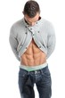 Powerful muscular man posing on a white background
