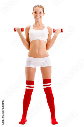 Photo: beautiful woman holding dumbbells beautiful woman holding dumbbells