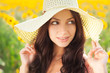 Beautiful lady walking in sunflower field