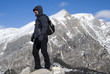 Mountaineer admiring the view after trek
