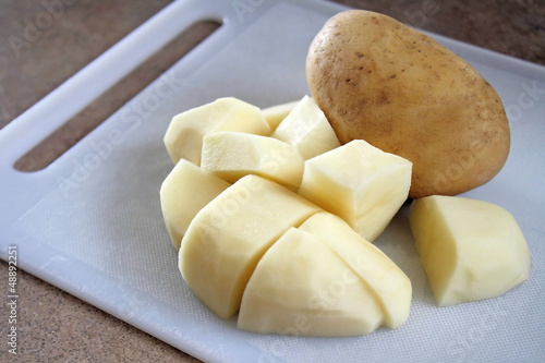 Photo: Potatoes on Cutting Board Potatoes on Cutting Board