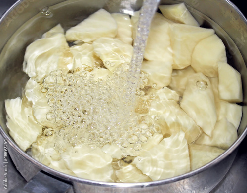 Photo: Fresh Peeled Potatoes In A Pot Of Water - ready for cooking Fresh Peeled Potatoes In A Pot Of Water - ready for cooking
