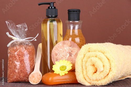 Photo: Set for care of a body on brown background Set for care of a body on brown background