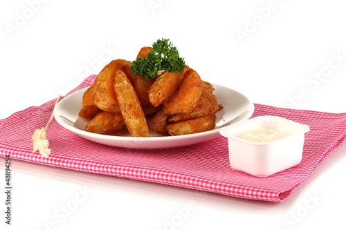 Photo: Appetizing village potatoes on plate isolated on white Appetizing village potatoes on plate isolated on white