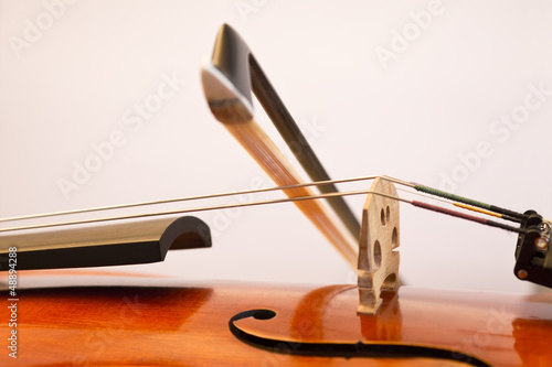 Photo: Violin bow on the string Violin bow on the string