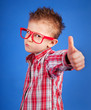 Photo: Cool five years old boy showing ok sign Cool five years old boy showing ok sign