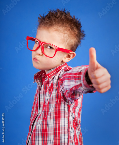 Photo: Cool five years old boy showing ok sign Cool five years old boy showing ok sign