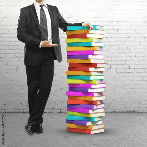 Photo: man and books man and books