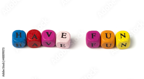 Photo: Words have fun on multicolored wooden cubes Words have fun on multicolored wooden cubes