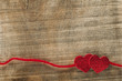 Photo: Red ribbon tape and two hearts Red ribbon tape and two hearts
