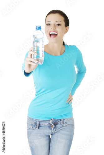 Photo: Woman with bottle of mineral water, Woman with bottle of mineral water,