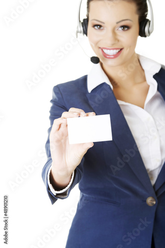 Photo: Customer service representative holding businesscard. Customer service representative holding businesscard.