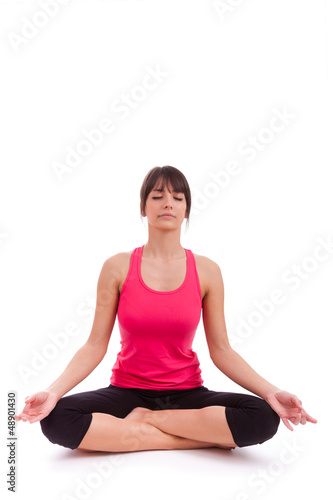 Photo: Beautiful caucasian woman in yoga position Beautiful caucasian woman in yoga position