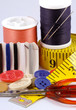 Some sewing tools such as threads, needles and scissors