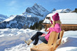 Girl with a camera in the Swiss Alps