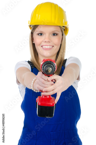 Photo: junge motivierte handwerkerin junge motivierte handwerkerin