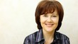 Woman-brunette of average years smiles