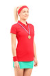 Winner female tennis player with a golden medal standing