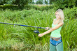 Photo: woman fishing in pond woman fishing in pond