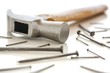 hammer and nails over white