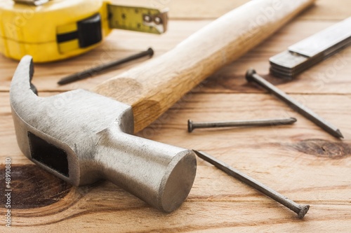 Photo: carpenter tools: hummer, tape measure, ruller and nails carpenter tools: hummer, tape measure, ruller and nails