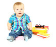 Little boy with multicolor books, isolated on white
