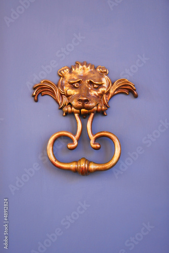 Photo: Italy, Ravenna very old door handle. Italy, Ravenna very old door handle.