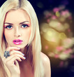 Beautiful blonde girl with lilac makeup