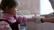 Little girl sit at surgery, doctor comes and makes injection