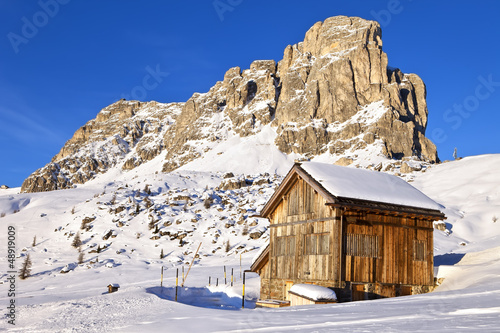 Photo: Mountains view and alpine hut at Giau pass, Dolomite Alps Mountains view and alpine hut at Giau pass, Dolomite Alps