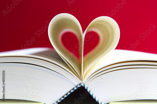 Photo: Pages of a book curved into a heart shape Pages of a book curved into a heart shape