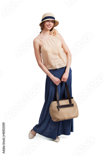 Photo: Beautiful woman wearing a straw hat Beautiful woman wearing a straw hat