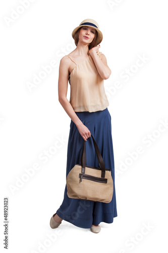 Photo: Beautiful young woman in retro suit Beautiful young woman in retro suit