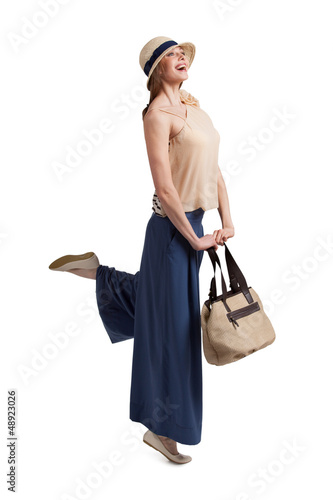 Photo: Enthusiastic fashionable woman in a hat Enthusiastic fashionable woman in a hat