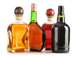 Composition with bottles of assorted alcoholic products isolated