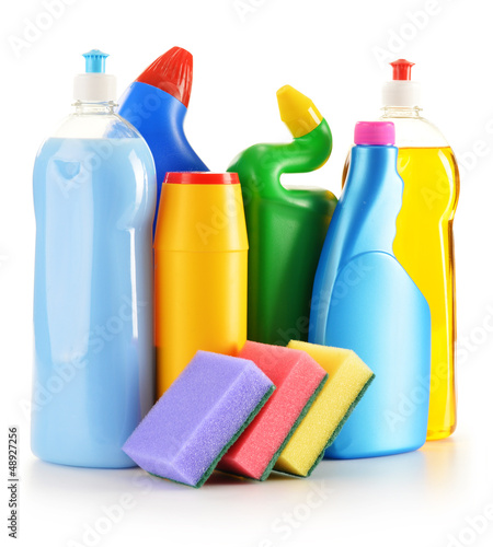 Photo: Detergent bottles isolated on white. Chemical cleaning supplies Detergent bottles isolated on white. Chemical cleaning supplies