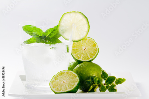 Photo: Limes, refreshing drink with ice, weight loss concept Limes, refreshing drink with ice, weight loss concept