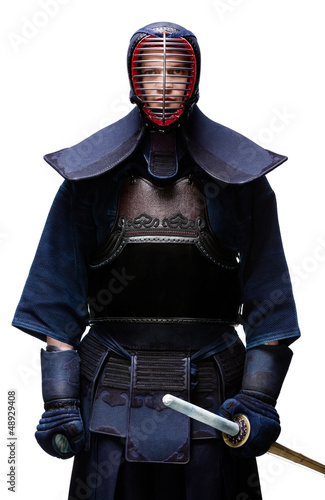 Photo: Portrait of equipped kendo fighter with shinai Portrait of equipped kendo fighter with shinai