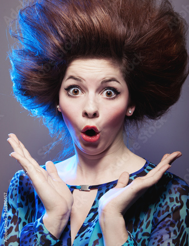 Photo: Portrait of an attractive surprised young woman Portrait of an attractive surprised young woman