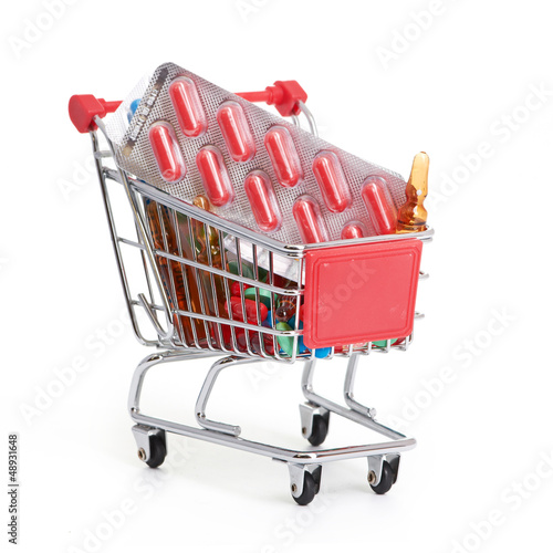 Photo: Shopping trolley with pills and medicine Shopping trolley with pills and medicine