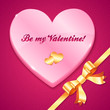 Pink plastic heart with sign, golden hearts, bow and ribbon