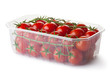 Photo: Cherry tomatoes on a branch in retail packaging Cherry tomatoes on a branch in retail packaging