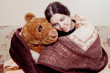 woman with teddy bear