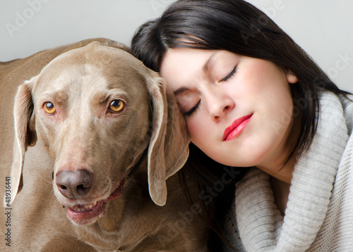 Photo: Young beautiful women with dog Young beautiful women with dog