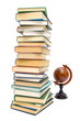 books and old globe isolated on white background