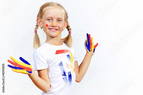 Photo: happy child with paint on the hands happy child with paint on the hands