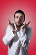 Young bearded man expressing with his hands